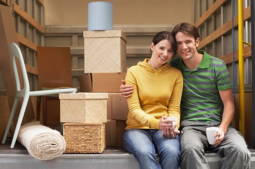 Careful moving of household furniture through a Barnes property