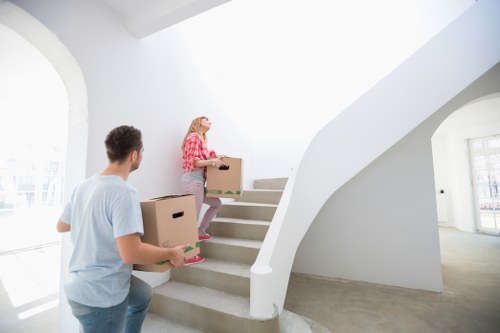 Packed household items ready for collection by house removalists in Barnes