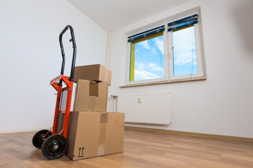 Business boxes and office equipment organised for a local move in Barnes