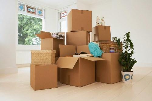 Careful handling of desks, boxes, and IT equipment during office removals in Barnes