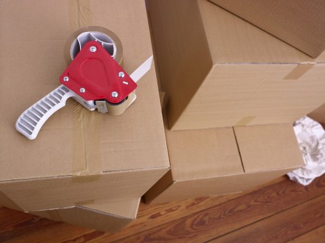Packed boxes and student belongings ready for transport